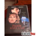 Eladó felhők közül a nap